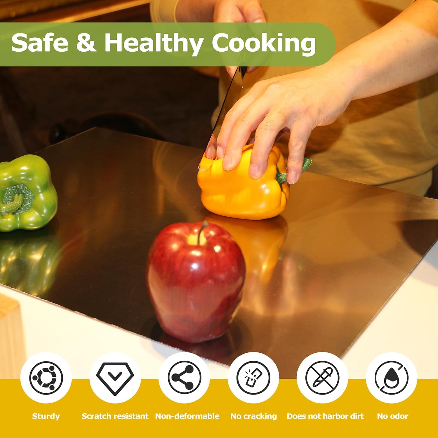 Preparing vegetables on a stainless steel board with product feature icons