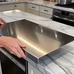 Close view of the board fitted over a counter edge
